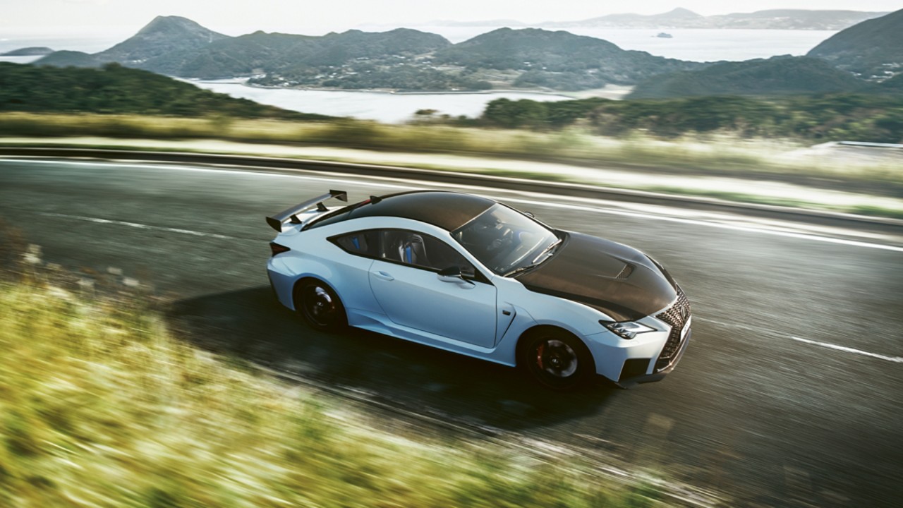 Lexus RC F driving on a hillside road